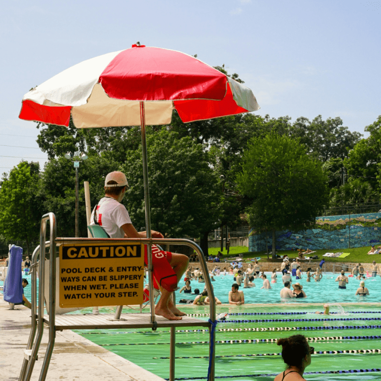 Lifeguard watches over pool