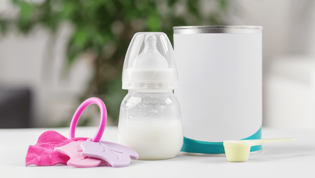 Photo of dry infant formula with filled bottle