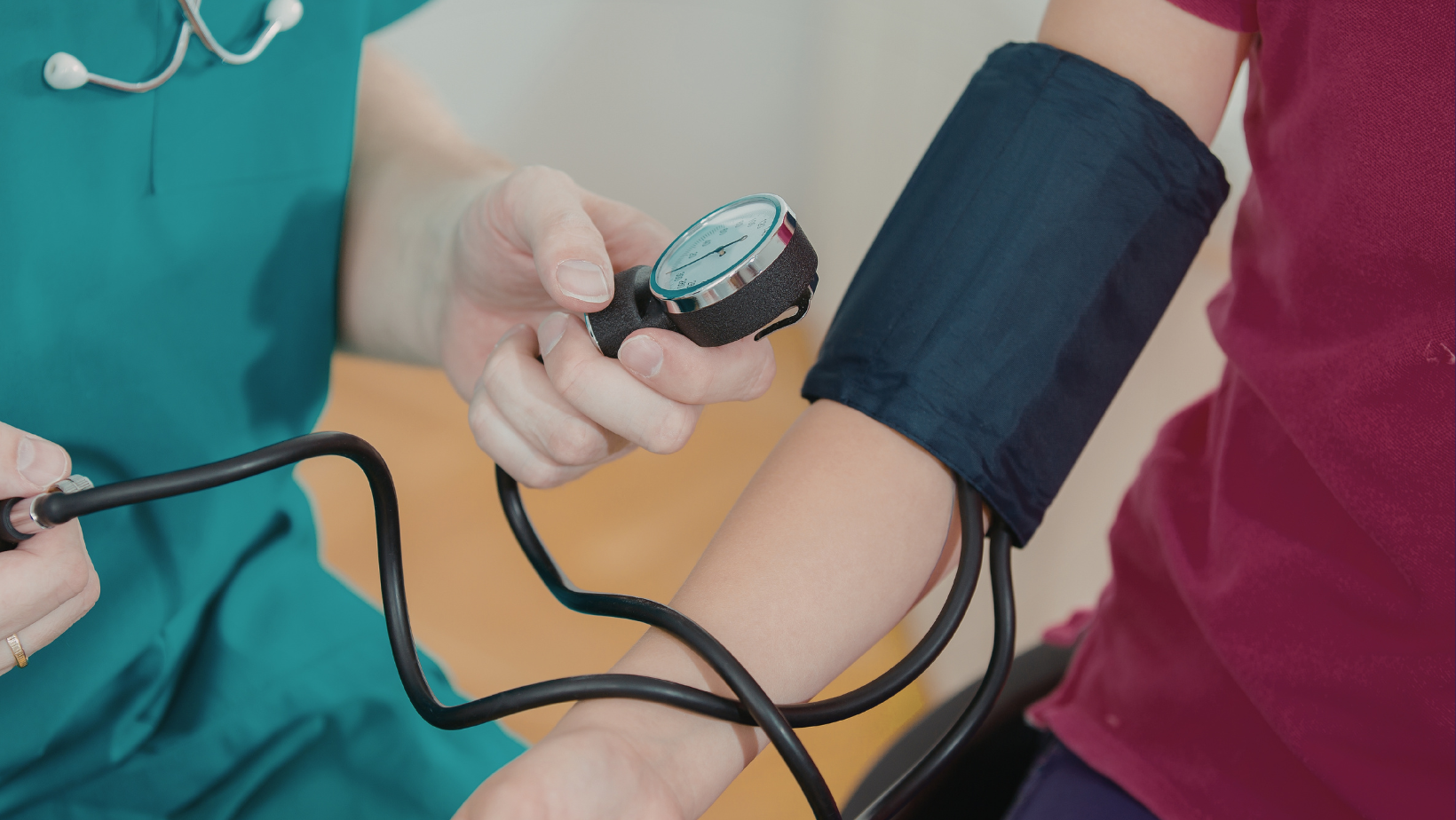 Nurse taking blood pressure